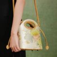 cc_Printed_Jacquard_Lotus_Khaki_Drawstring_Bucket_Bag_LD120670