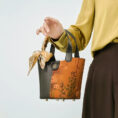 model-arm-carry-plum-blossom-handbag-front