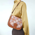 model-carrying-brocade-messenger-bag-shoulder