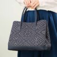 zhuang-brocade-embroidered-leather-shoulder-bag-model-double-handheld-blue-dress