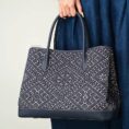 zhuang-brocade-embroidered-leather-shoulder-bag-model-single-handheld-blue-dress